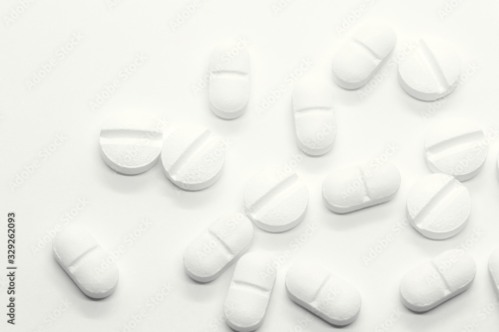prescription pills on white background closeup prescription pills on white background closeup