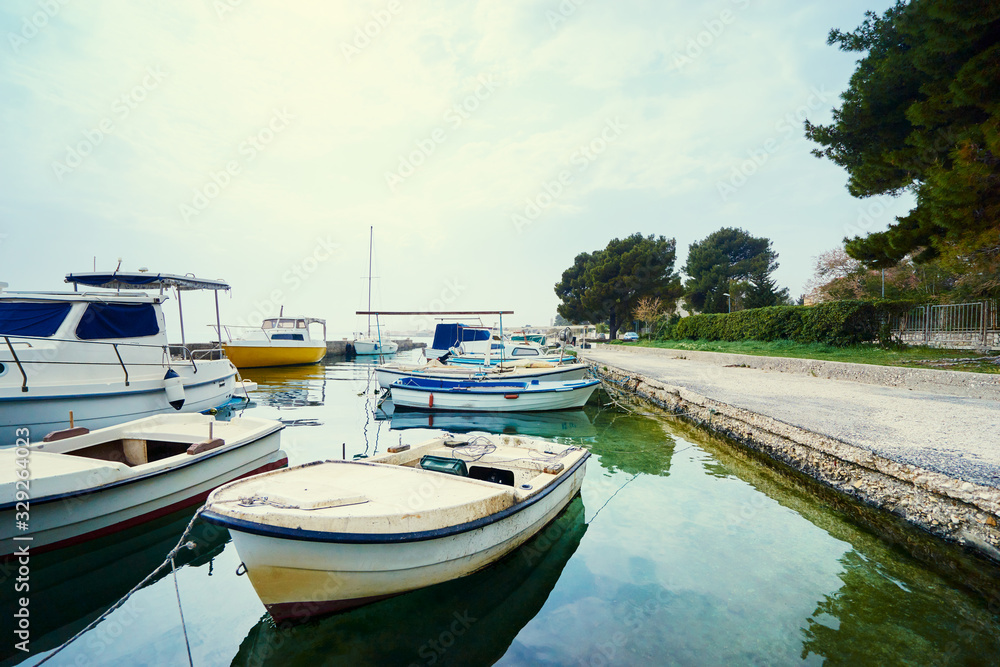 Harbor with leisure and fishing boats at anchor, Dalmatia, Croatia.