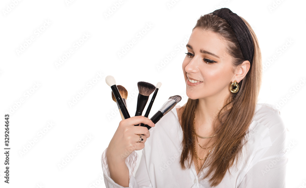 Makeup artist with brushes isolated on white. Makeup artist with brushes isolated on white.