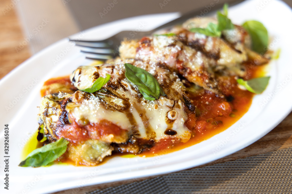 Cheese gratinated baked eggplant with Spanish Tomato Sauce