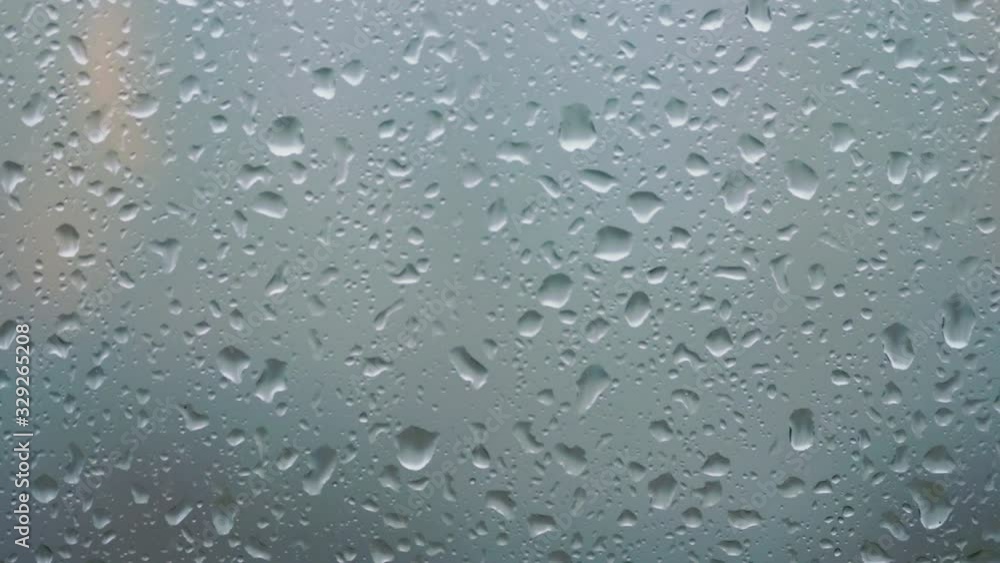 Close up shot of raindrop. Drops of rain on window glass. 4K Close up shot of raindrop. Drops of rain on window glass. 4K