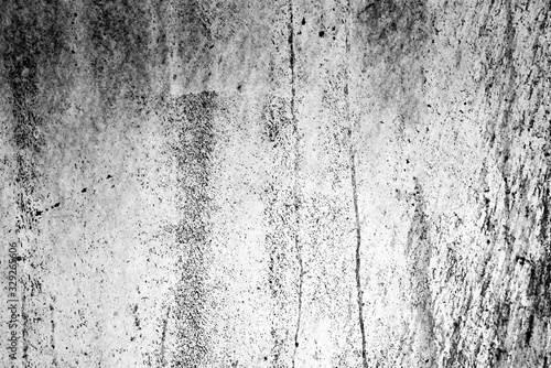 Texture of a metal wall with cracks and scratches which can be used as a background © chernikovatv