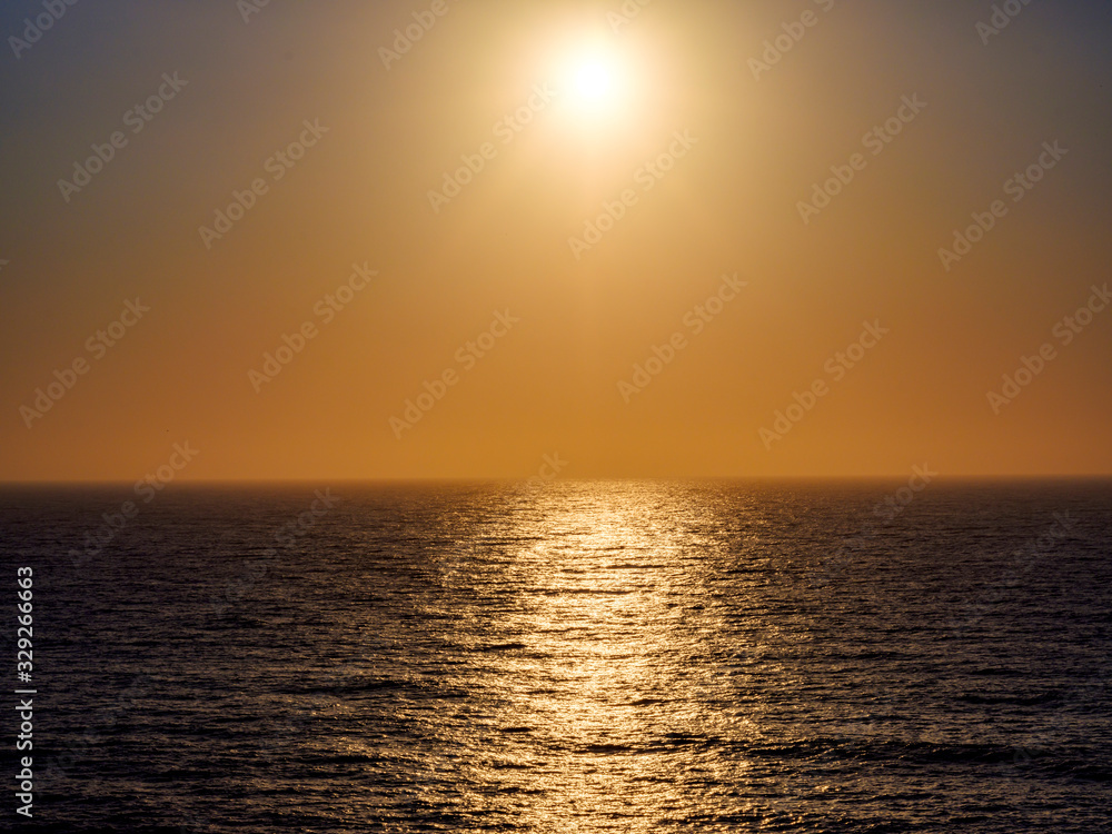 Calm sea at sunset