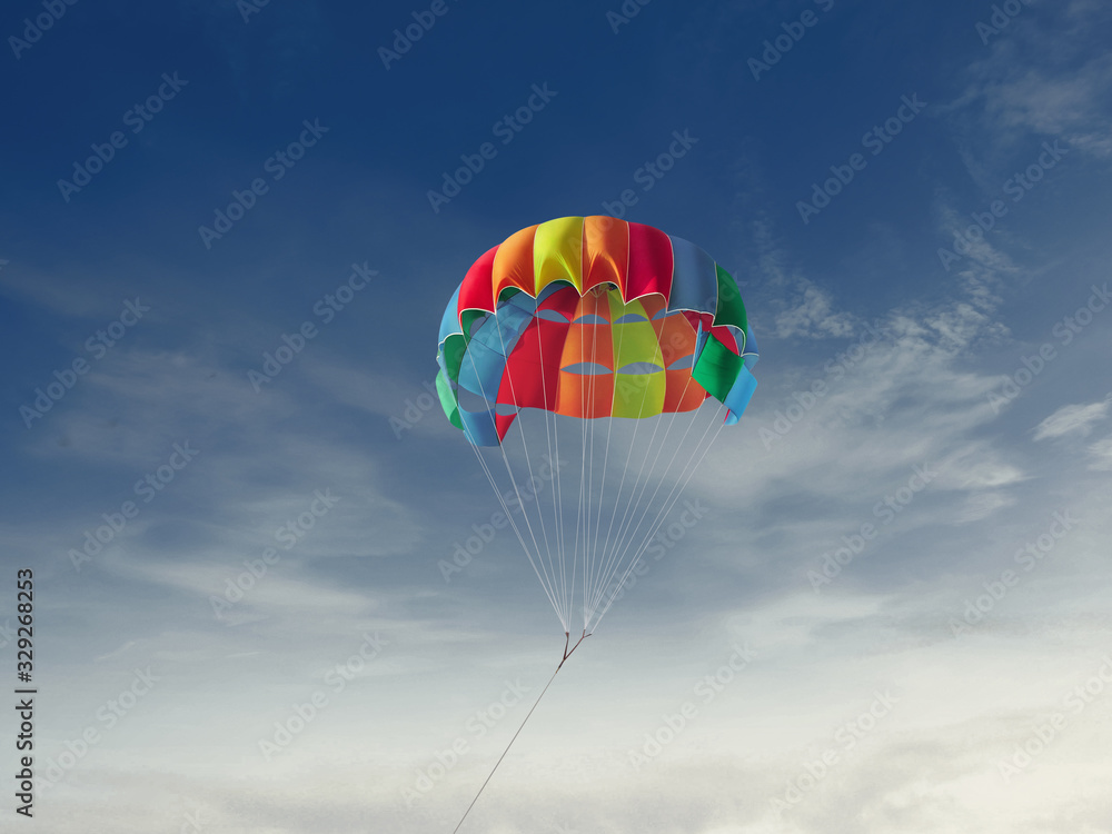 The colorful parachute stripes on the sky,Summer Camp in Beach The colorful parachute stripes on the sky,Summer Camp in Beach