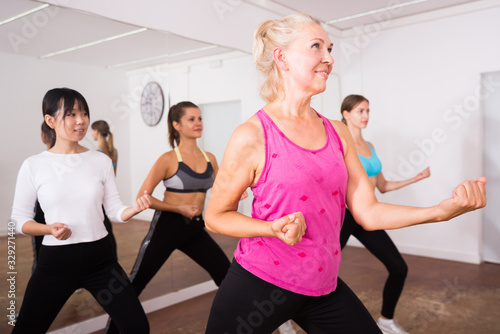 Ordinary active females exercising dance moves