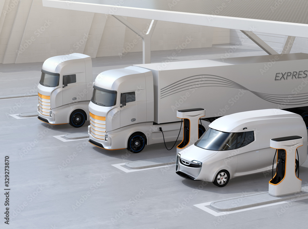 Generic design Heavy Electric Trucks charging at Public Charging Station with roof-mounted solar panels. 3D rendering image. Generic design Heavy Electric Trucks charging at Public Charging Station with roof-mounted solar panels. 3D rendering image.