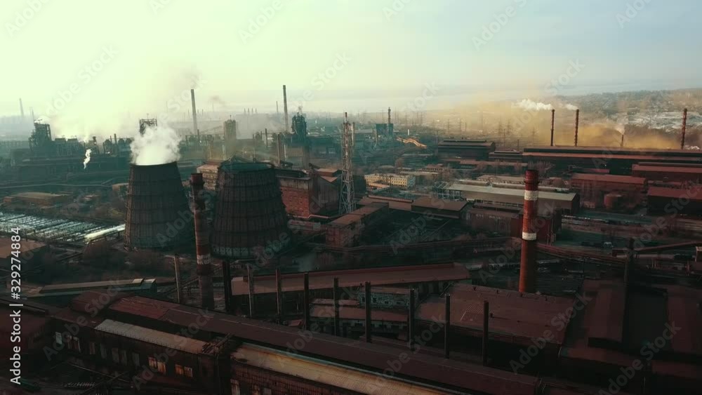 Steel mill metallurgical plant bad ecology smoke from pipes aerial video 4K. Steel mill metallurgical plant bad ecology smoke from pipes aerial video 4K.