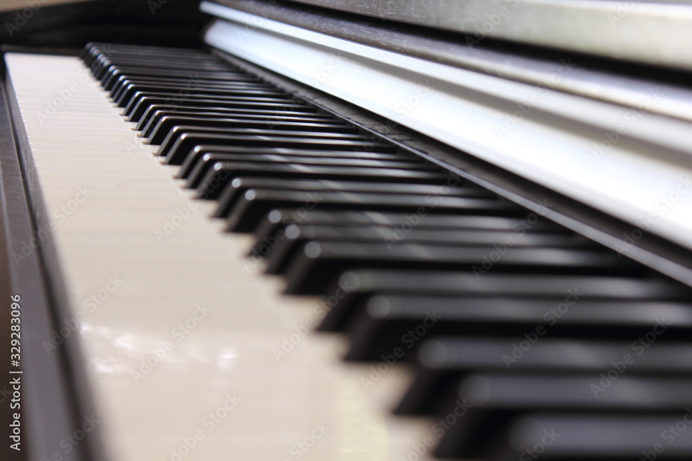A classic piano in an empty room A classic piano in an empty room
