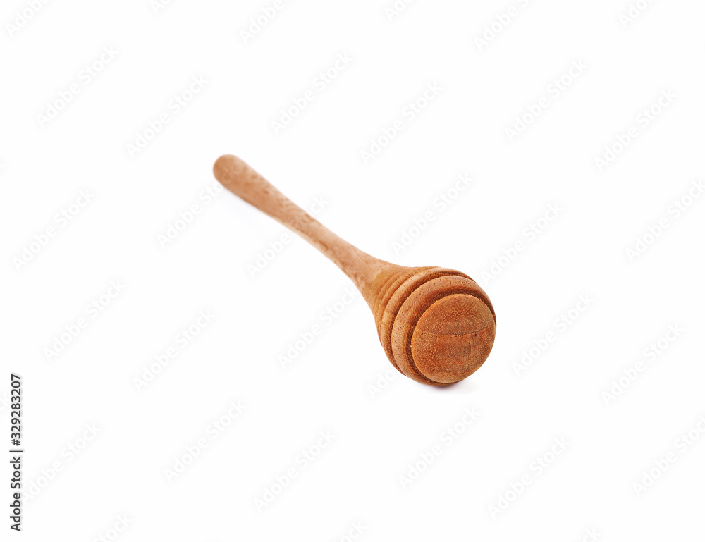 Wooden honey scoop isolated on white background Wooden honey scoop isolated on white background
