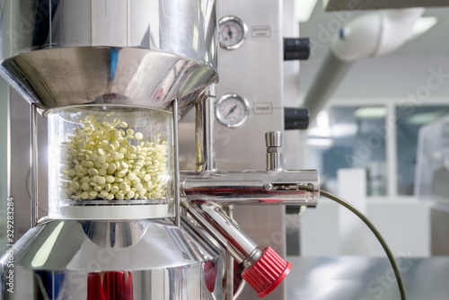 Process of production of pills, tablets. Industrial pharmaceutical concept