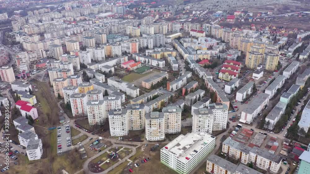 Aerial view of Manastur neighborhood residential area, real estate, demographic explosion, agglomeration of flat of blocks built in the Communist period of dictator Ceausescu in Cluj Napoca, Romania Aerial view of Manastur neighborhood residential area, real estate, demographic explosion, agglomeration of flat of blocks built in the Communist period of dictator Ceausescu in Cluj Napoca, Romania