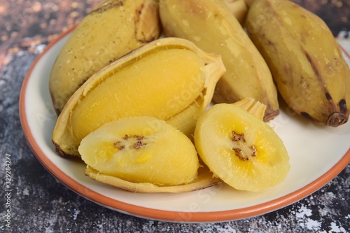 Pisang rebus or boiled banana. Pisang Kepok or Saba banana photo