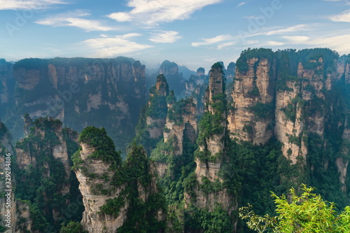 Gigantic pillar mountains rising from the canyon. Yellow Stone Stronghold  Huangshi Zhai   Zhangjiajie Natural Park  Hunan province  China. 