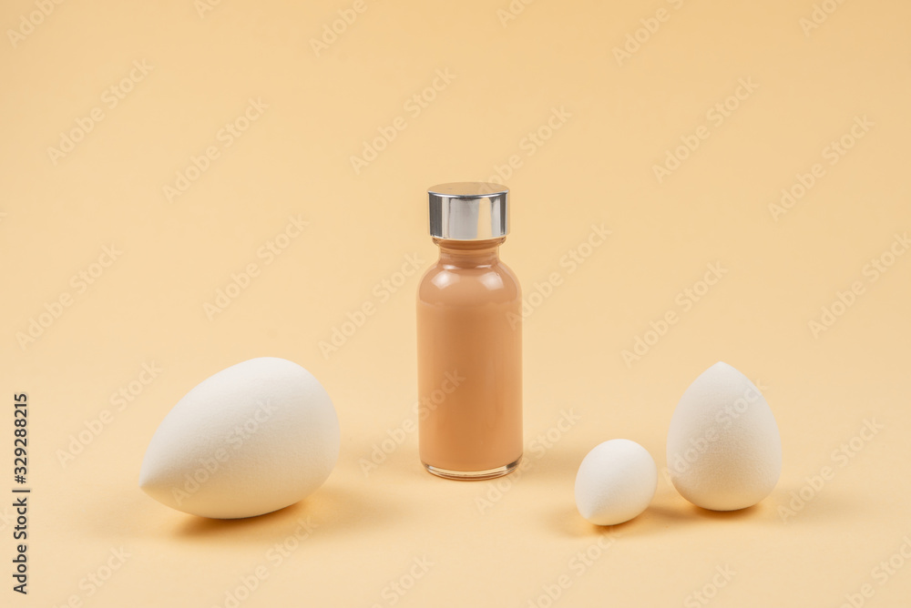 Small, medium and large white beauty blender and makeup foundation. Small, medium and large white beauty blender and makeup foundation.