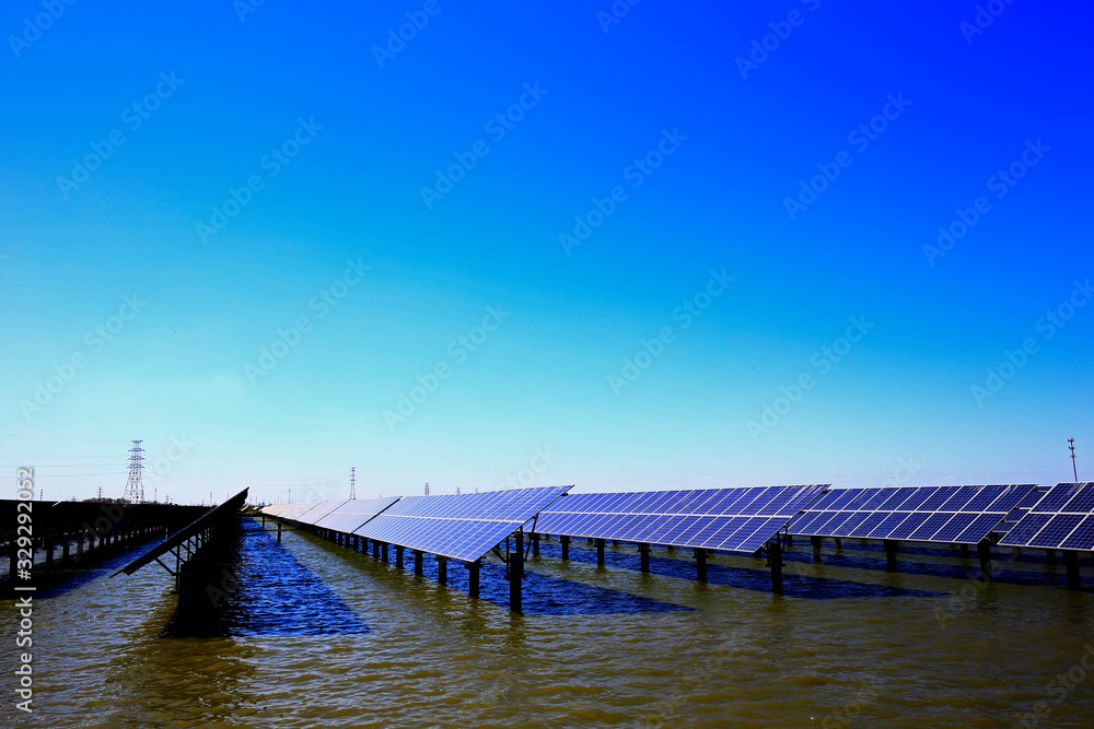Fototapeta premium Solar panels on the water