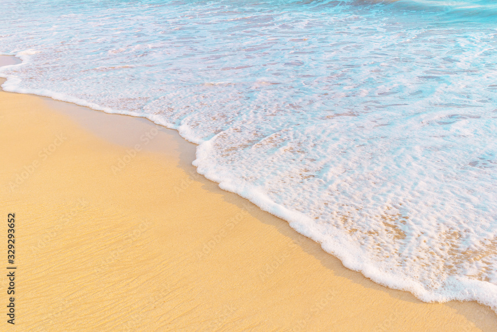 Tropical shore. Sandy beach and wavy sea in warm sunset light. Tropical shore. Sandy beach and wavy sea in warm sunset light.
