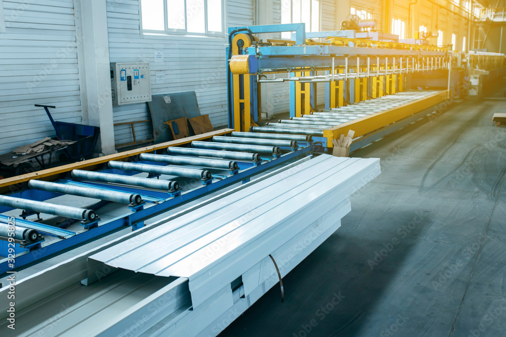 Fotografie Metal sheet roof rolled from rolling machine