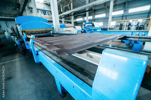 Metal tile manufacturing factory. Steel sheet metal