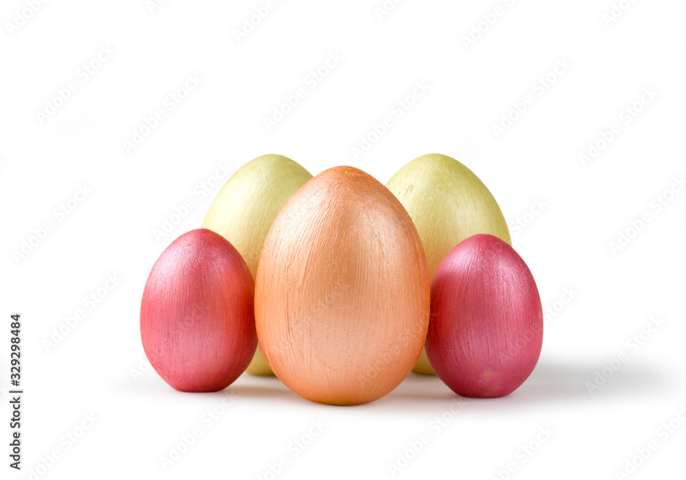 Cute golden and pink metallic Easter eggs isolated on white. Cute golden and pink metallic Easter eggs isolated on white.