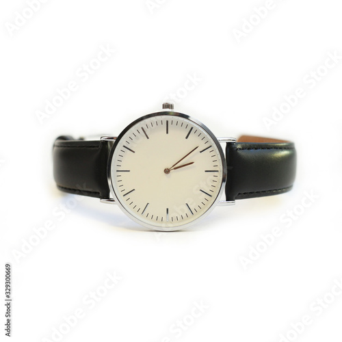 wristwatch with a black strap and a white dial on an isolated white background.