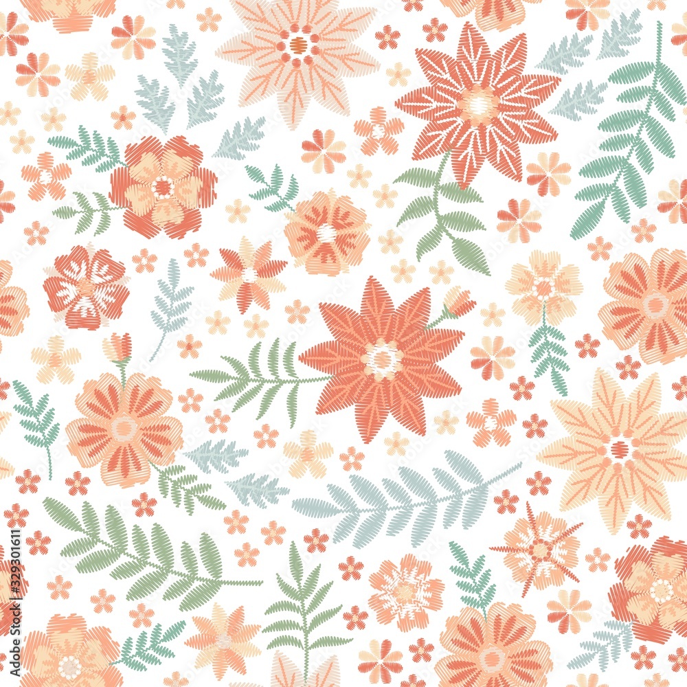 Beautiful embroidered flowers on white background. Elegant seamless pattern. Print for fabric.