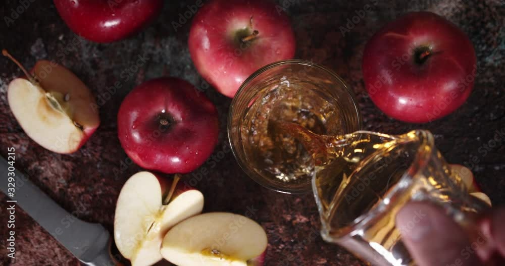 Pour the Apple juice into a glass . Pour the Apple juice into a glass .
