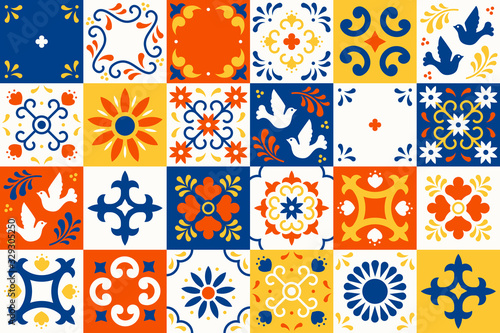 Mexican talavera pattern. Ceramic tiles with flower, leaves and bird ornaments in traditional majolica style from Puebla. Mexico floral mosaic in classic blue and white. Folk art design. photo