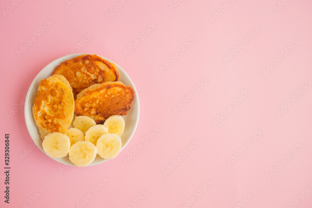 Pancakes with berries on a bright pastel background, copy space. Pancakes with berries on a bright pastel background, copy space.