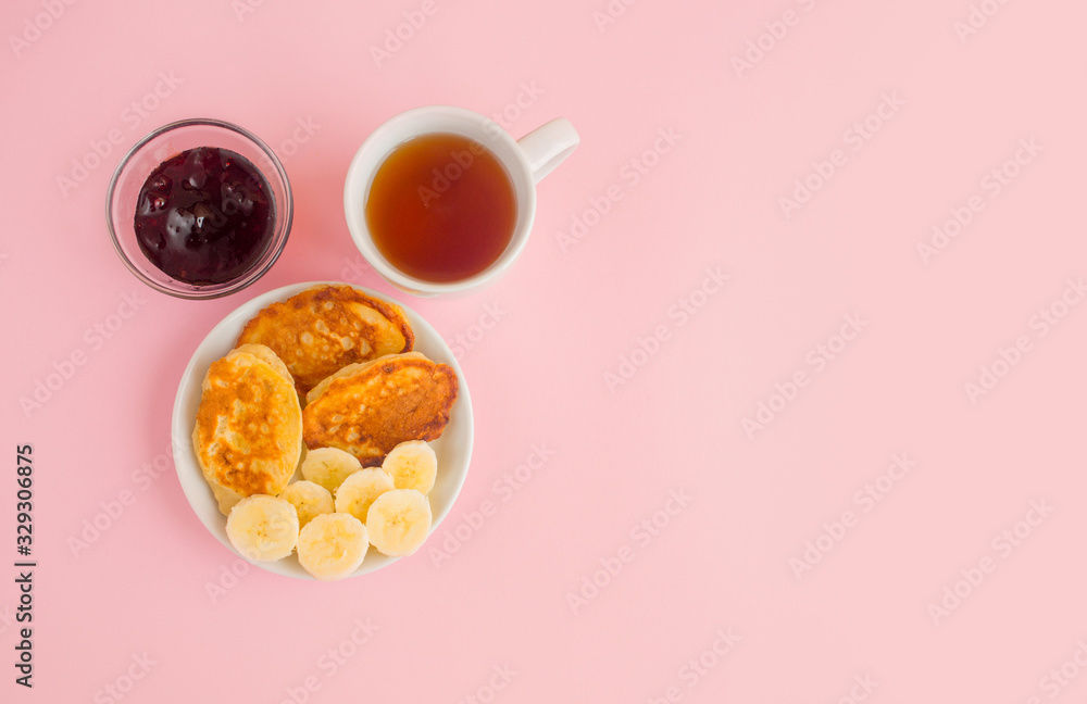 Pancakes with berries on a bright pastel background, copy space. Pancakes with berries on a bright pastel background, copy space.