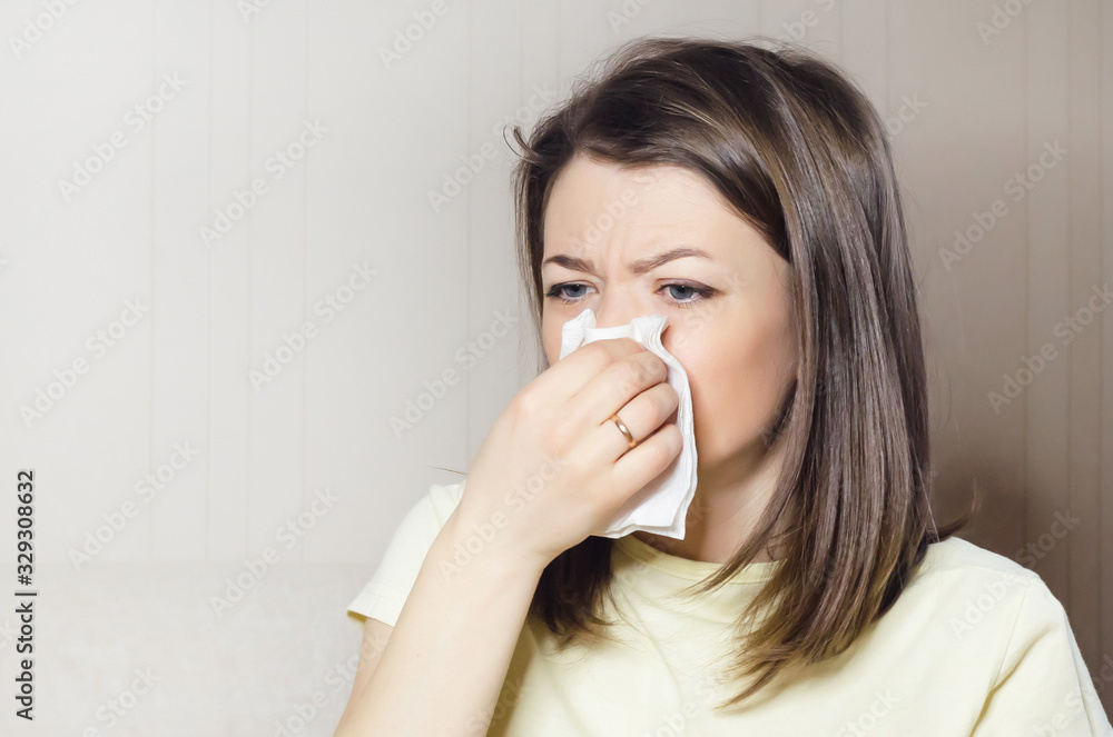 woman holds handkerchief, napkin in her hand. runny nose, common cold, virus woman holds handkerchief, napkin in her hand. runny nose, common cold, virus