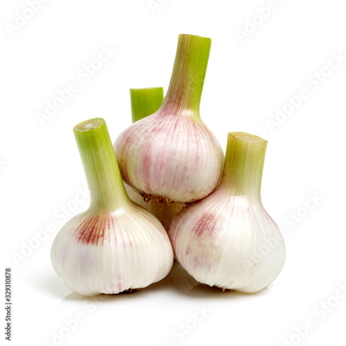 Fresh young garlic isolated on white background