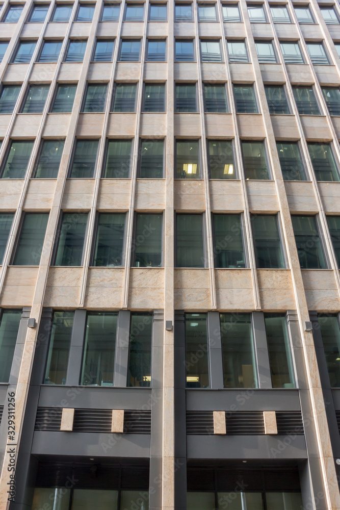 Facade of a modern office building. Office cells. Urban landscape, texture. Abstract background,. Facade of a modern office building. Office cells. Urban landscape, texture. Abstract background,.