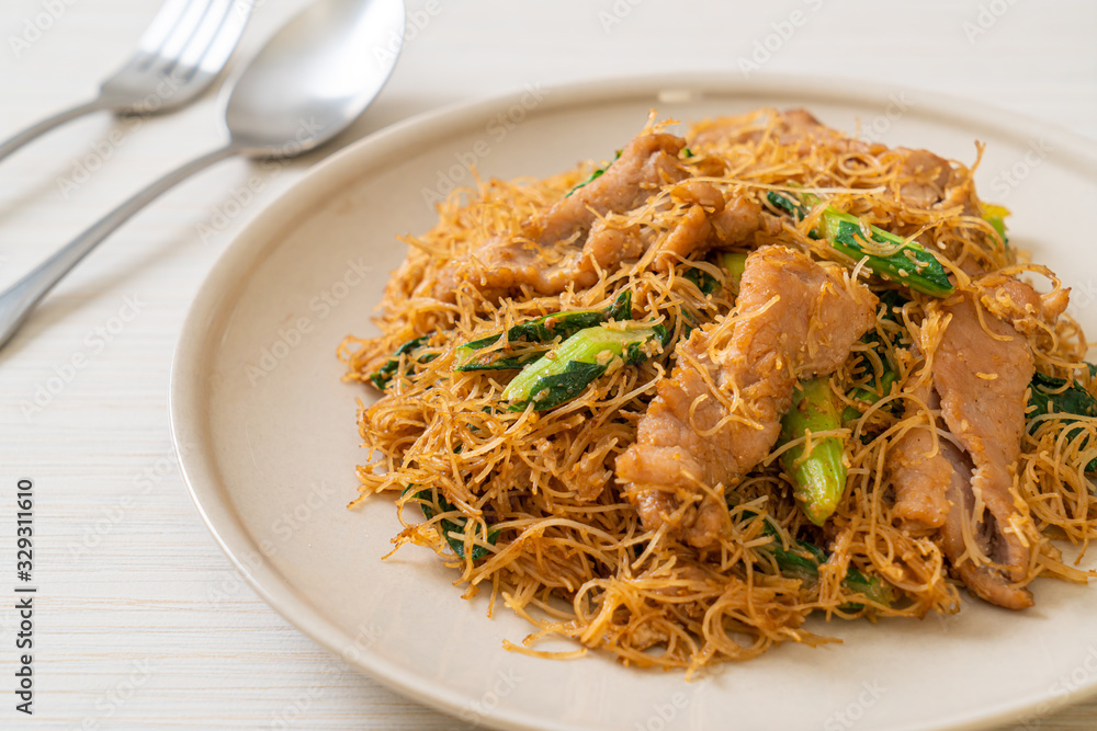 Stir fried rice vermicelli noodle with black soy sauce and pork Stir fried rice vermicelli noodle with black soy sauce and pork