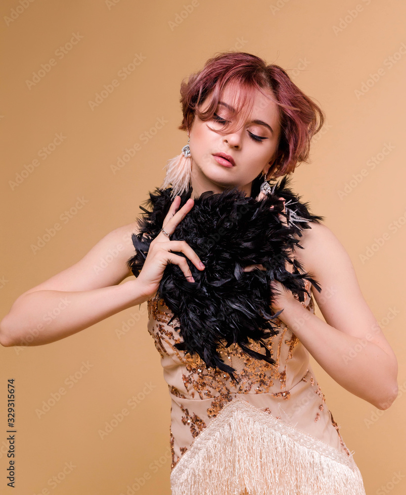 Beautiful retro woman from the roaring 20s on beige background - Vintage style image of a flapper girl