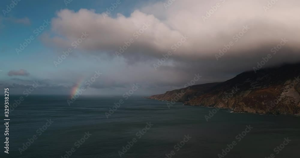 Scenic 4K video of Slieve League cliffs and Atlantic ocean with moving clouds in stormy weather, Donegal, Ireland Scenic 4K video of Slieve League cliffs and Atlantic ocean with moving clouds in stormy weather, Donegal, Ireland