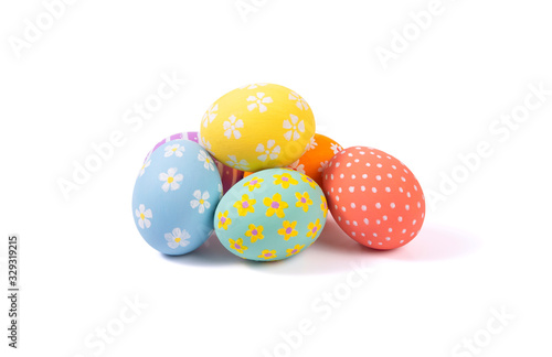 Canvas Print Group Easter eggs varios colored on isolated white background.