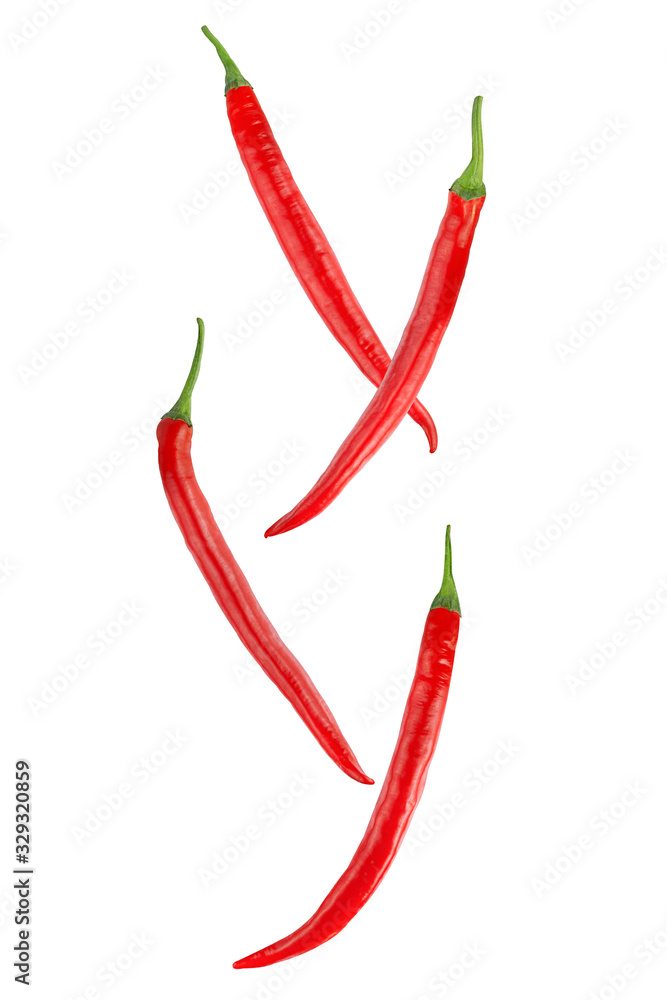 Falling red hot chilli peppers isolated on a white background, clipping path, full depth of field. Flying food Falling red hot chilli peppers isolated on a white background, clipping path, full depth of field. Flying food