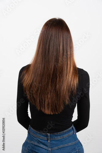 A lady with contemporary haircut style and long hairs in elegant and business haircut