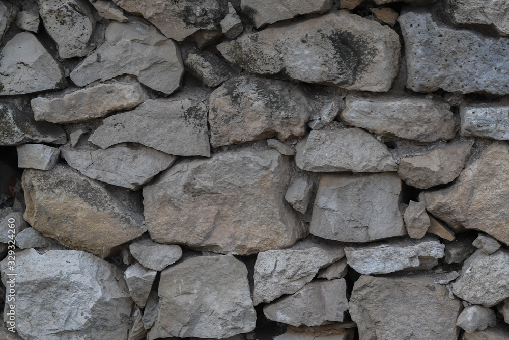 white stones, natural material to use as a background, natural stone texture, quarry, old house wall made of natural stone white stones, natural material to use as a background, natural stone texture, quarry, old house wall made of natural stone