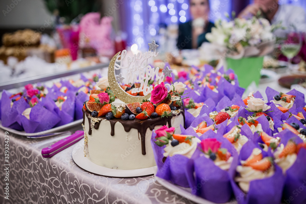 wedding cake with a candy bar in a restaurant