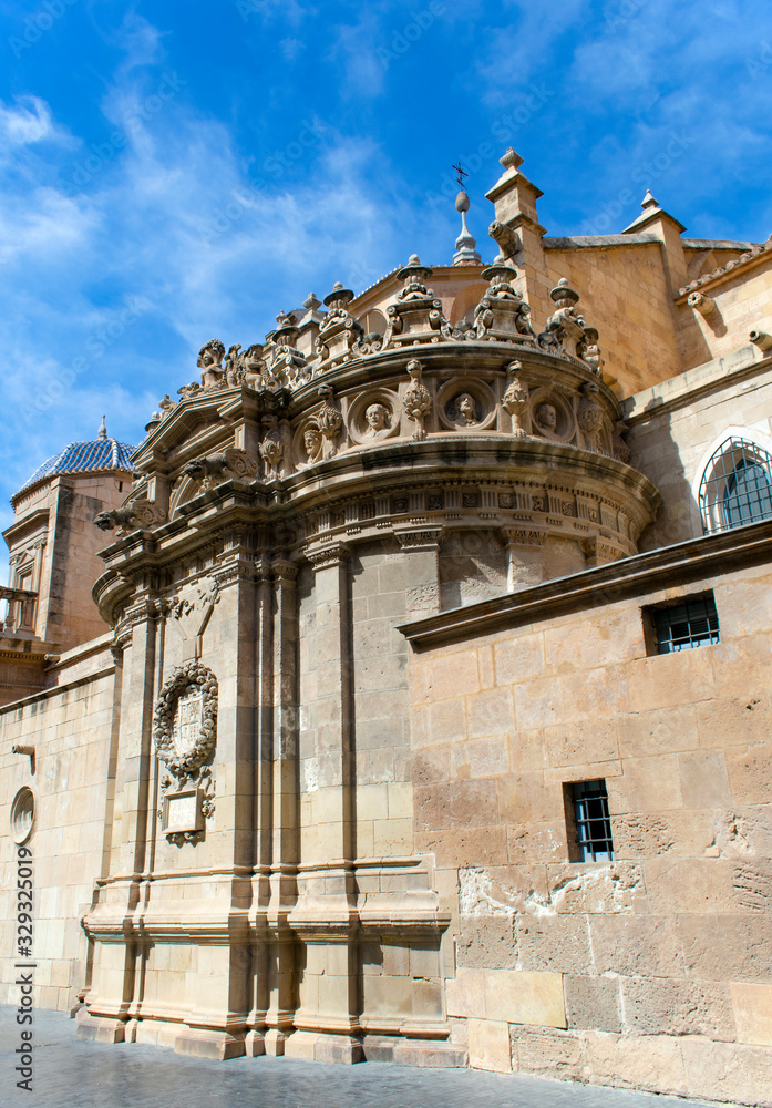 The beautiful cathedral of Saint Mary in the Spanish city of Murcia. The elborate and ornate roof tops of this monument.