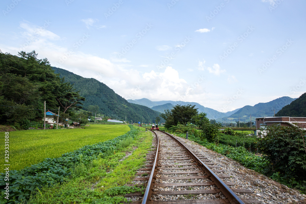 Old railroad tracks and rail bikes in Jeongseon-gun, South Korea.