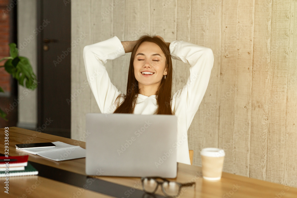 Break during work. Freelance girl closed eyes Break during work. Freelance girl closed eyes