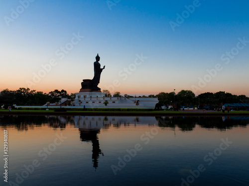 Standing Buddha statue in Thailand