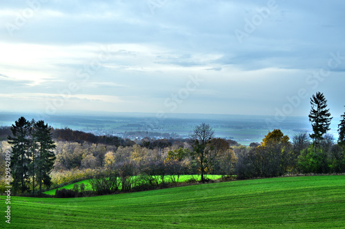 HDR landscape with blue sky and extra green grass
