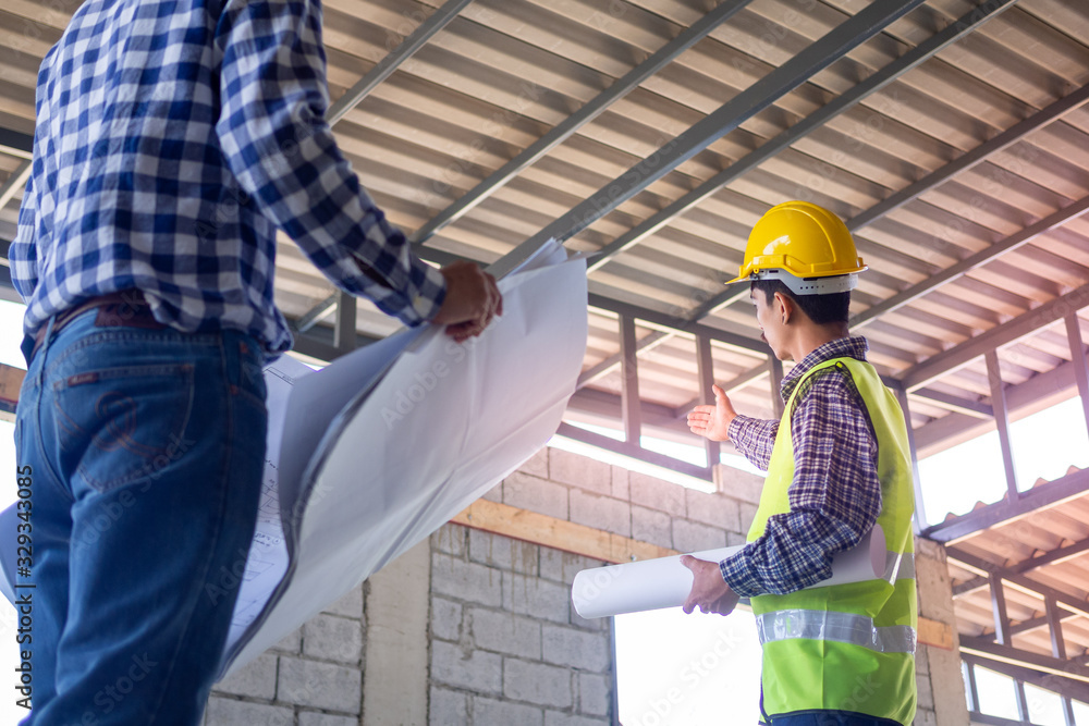 Inspectors check the completeness of the construction of the house. Discuss methods and solve building structure problems with contractors or engineers. Inspectors check the completeness of the construction of the house. Discuss methods and solve building structure problems with contractors or engineers.