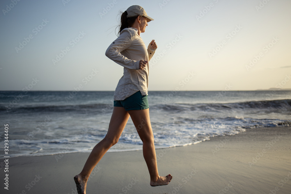 Young woman having fun at the ocean beach Young woman having fun at the ocean beach