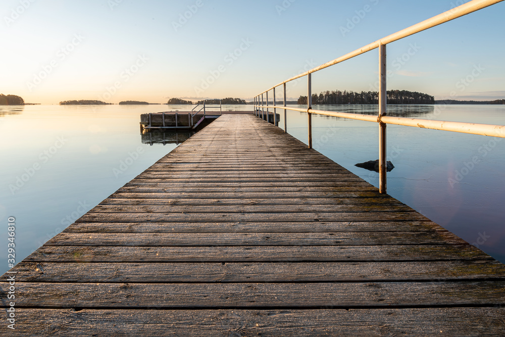 Obraz premium wooden bridge on the lake
