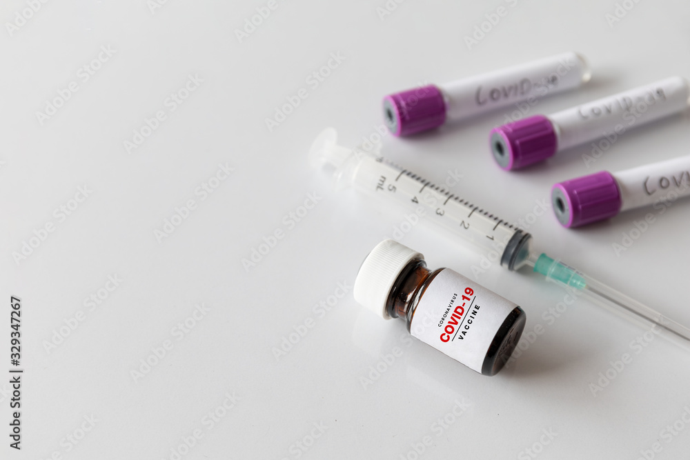 closeup vaccine against coronavirus ( COVID-19 ) with soft-focus and over light in the background closeup vaccine against coronavirus ( COVID-19 ) with soft-focus and over light in the background