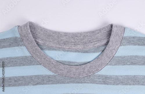 the collar of the t shirt is grey blue on a white background